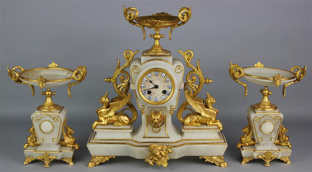 Appraisal: AESTHETIC MOVEMENT GILT METAL MOUNTED ALABASTER THREE-PIECE CLOCK GARNITURE second