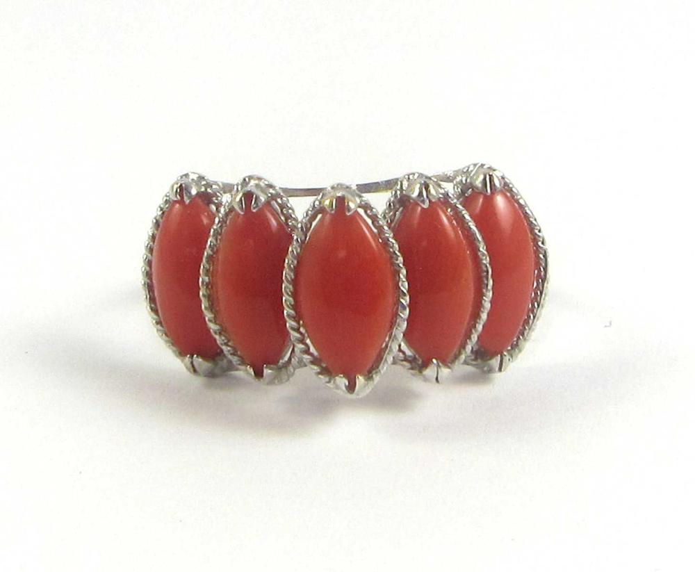 Appraisal: CORAL AND FOURTEEN KARAT WHITE GOLD RING prong set with