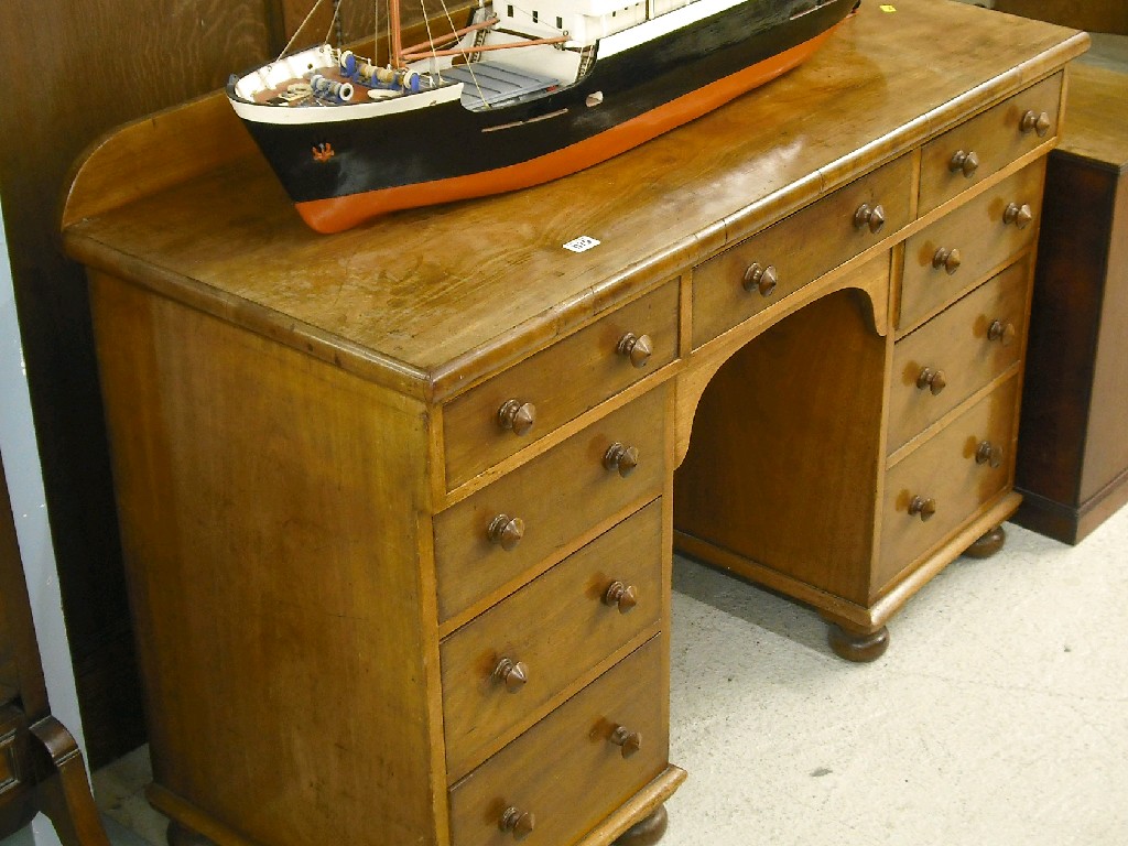 Appraisal: Victorian mahogany kneehole desk the moulded top with short raised