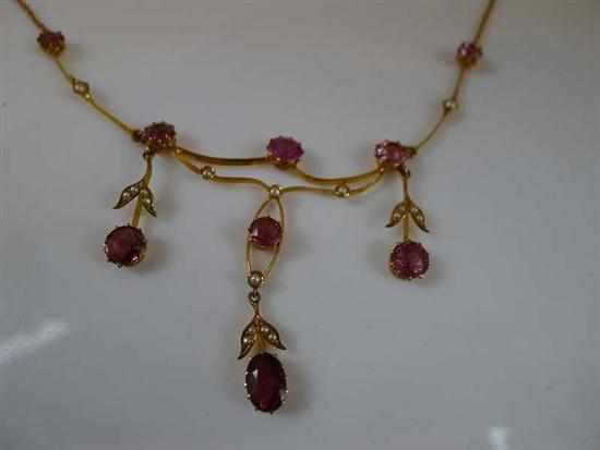 Appraisal: A EDWARDIAN TOURMALINE AND SEED PEARL NECKLACE STAMPED CT GOLD