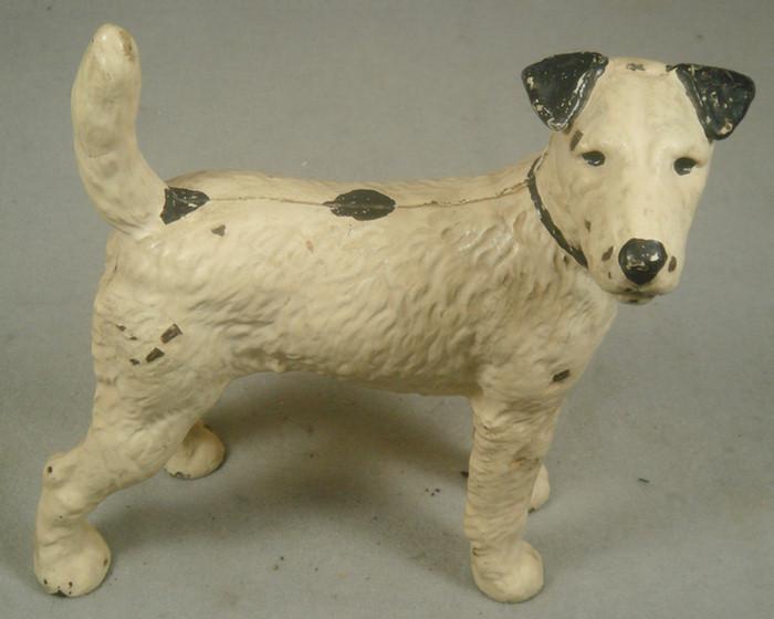 Appraisal: Cast iron doorstop free standing black and white Airedale repainting