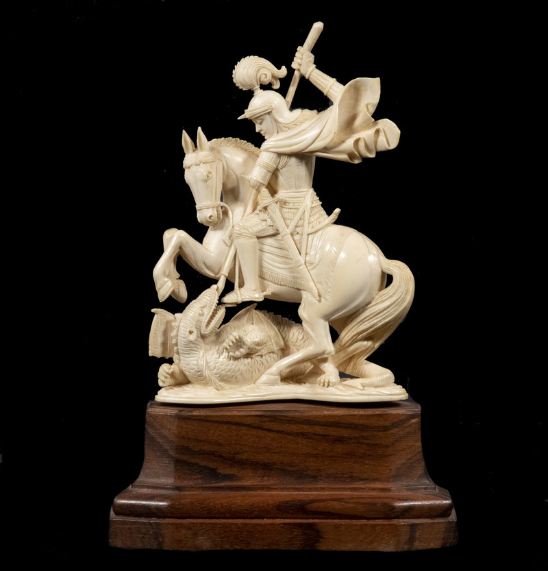 Appraisal: TH C IVORY FIGURE OF SAINT GEORGE SLAYING THE DRAGON