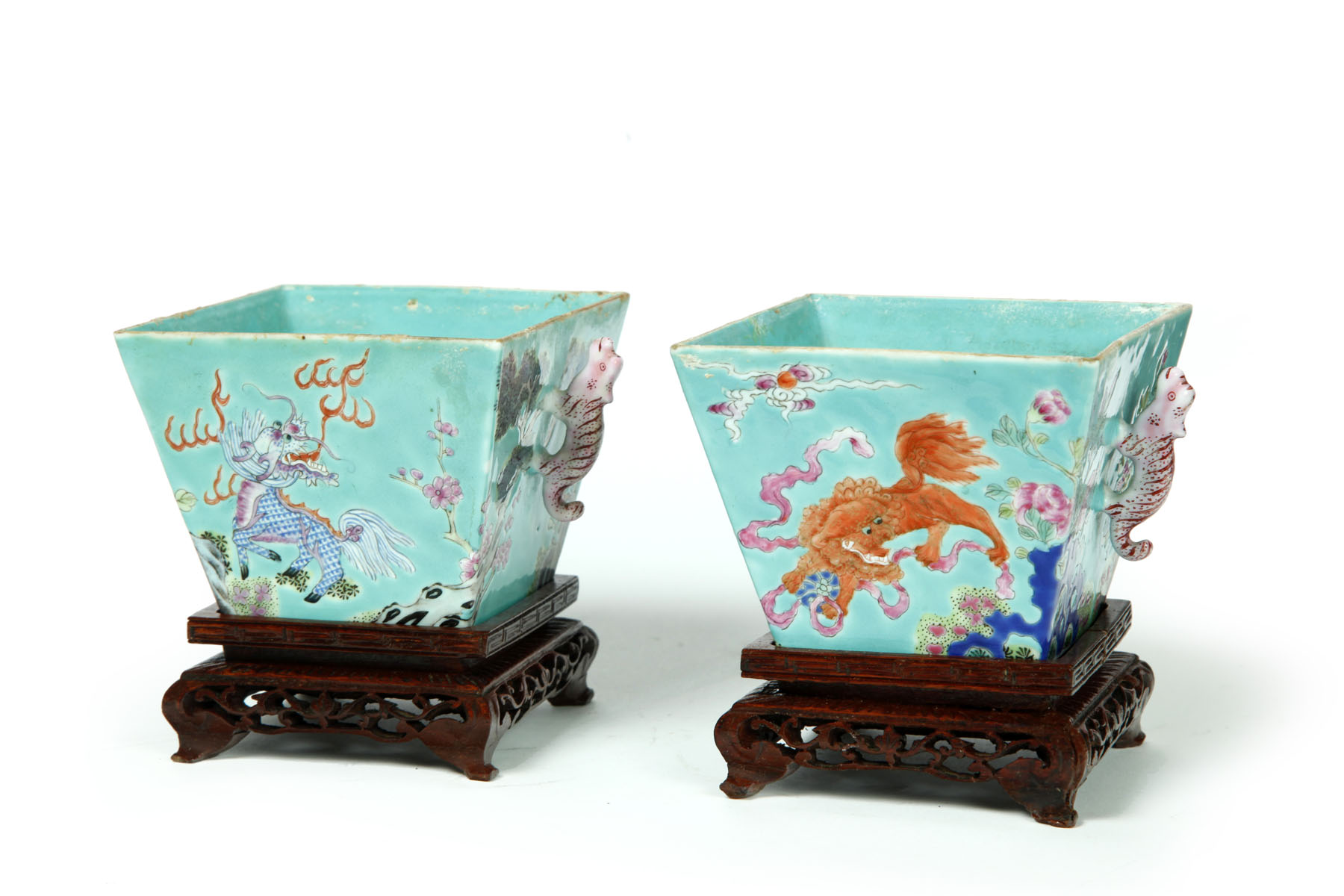 Appraisal: PAIR OF SMALL PORCELAIN JARDINIERES China red Jiaqing marks Mythical