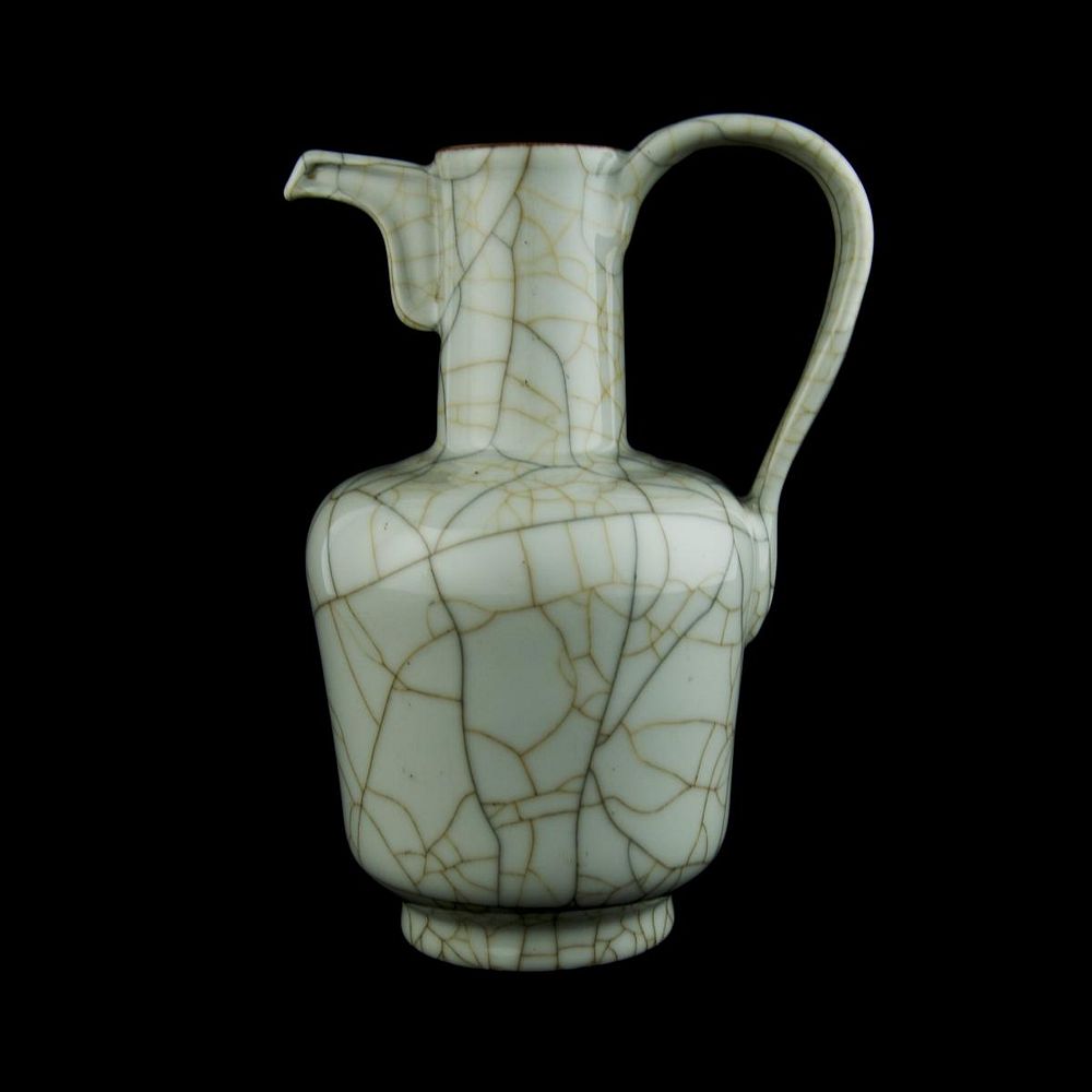 Appraisal: CHINESE CELADON CRACKLE GLAZED WINE PITCHER Antique Chinese celadon green