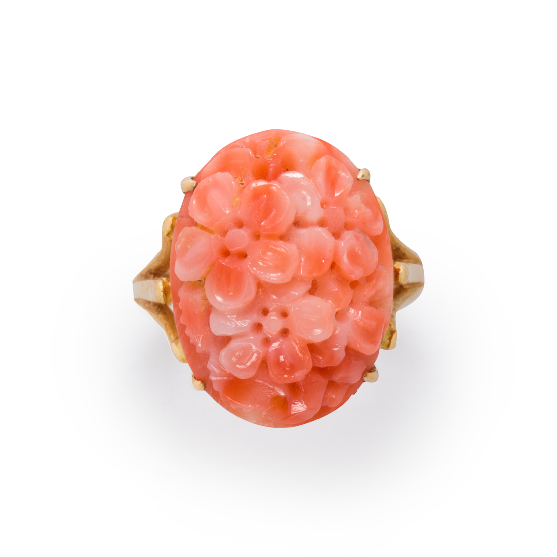 Appraisal: A CORAL AND FOURTEEN KARAT GOLD RING A coral and