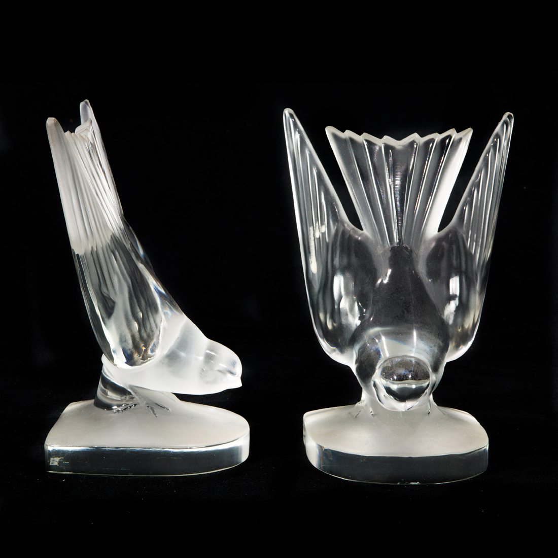 Appraisal: A PAIR OF LALIQUE CLEAR AND FROSTED GLASS HIRONDELLE BOOKENDS