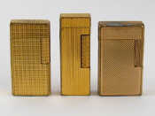 Appraisal: Two Dunhill cigarette lighters one with ribbed the other with