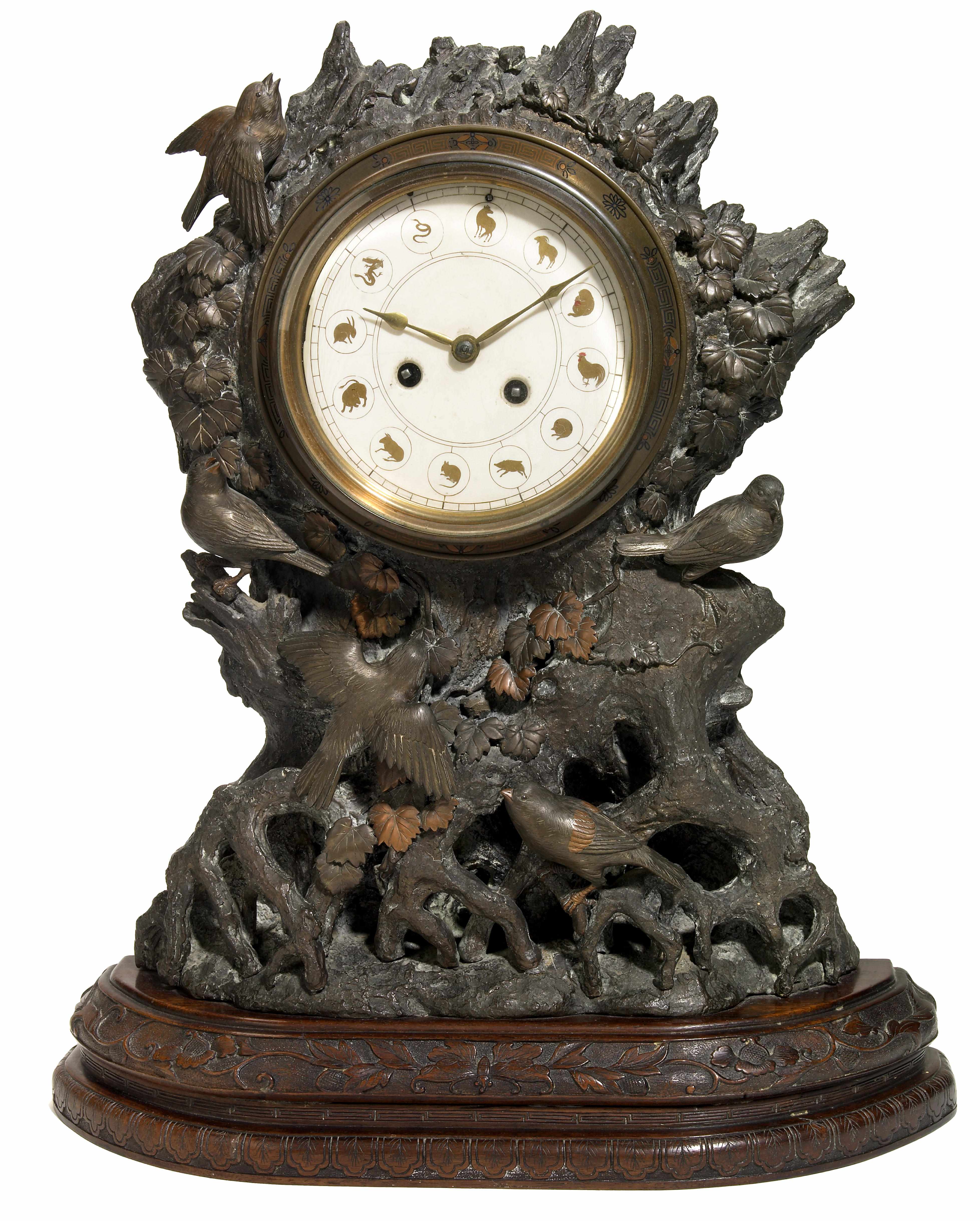 Appraisal: A Continental patinated bronze mantel clock circa height in