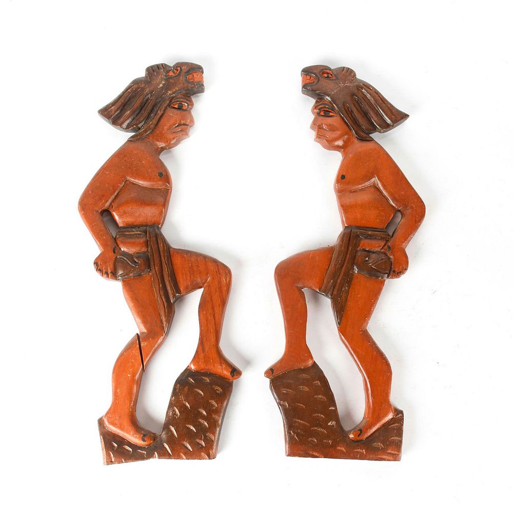 Appraisal: WOOD TRIBAL WALL FIGURES MEN IN HEADDRESS AND LOINCLOTH Pair