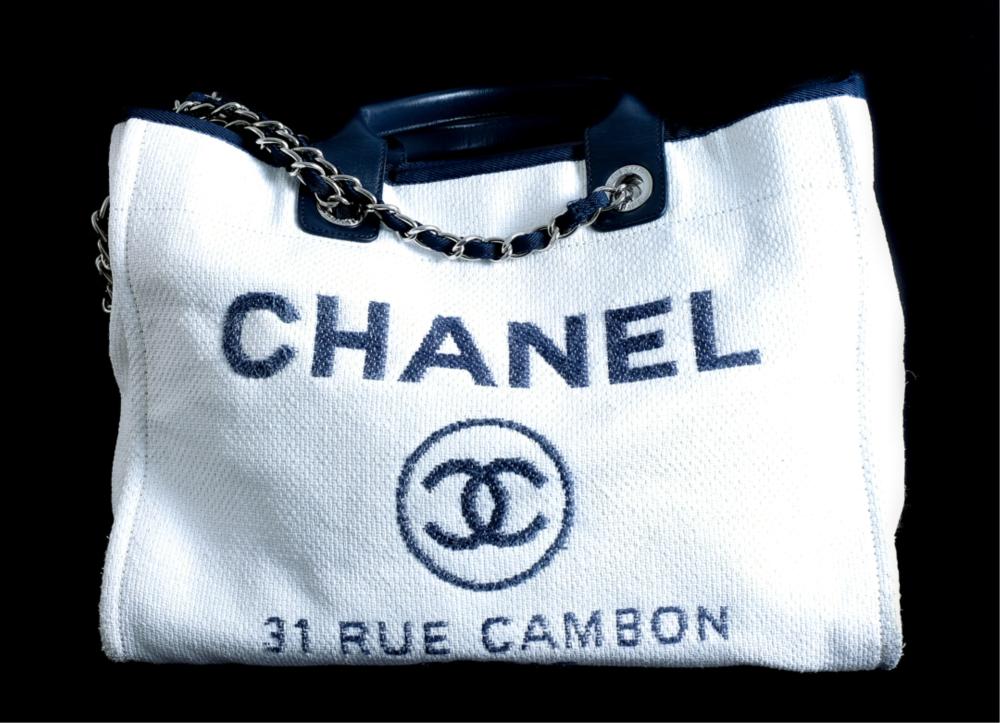 Appraisal: RARE JUMBO CHANEL CANVAS CONVERTIBLE TOTE BAGMassive and rare Chanel