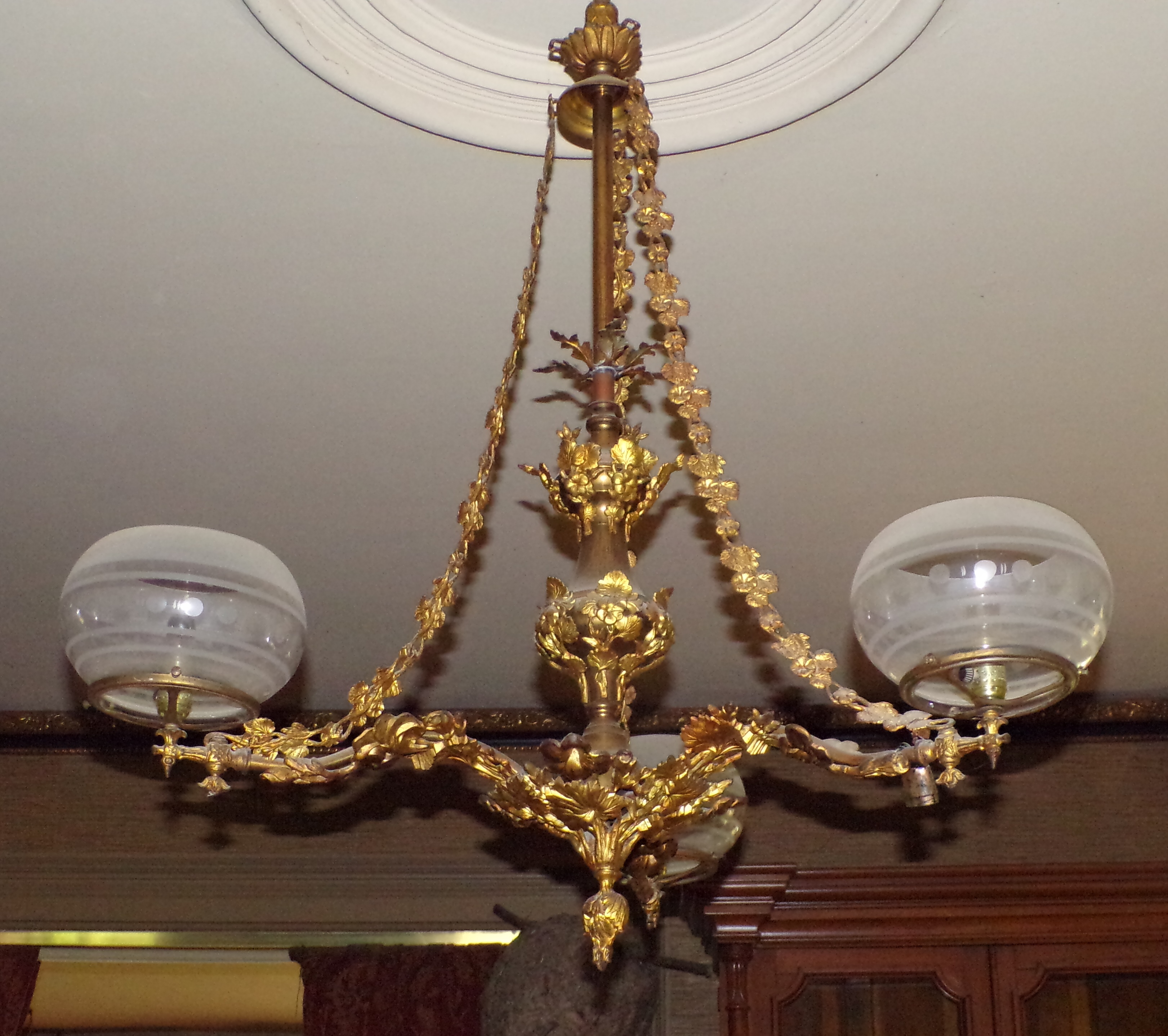 Appraisal: Brass and gilt -arm gasolier with etching and frosted glass