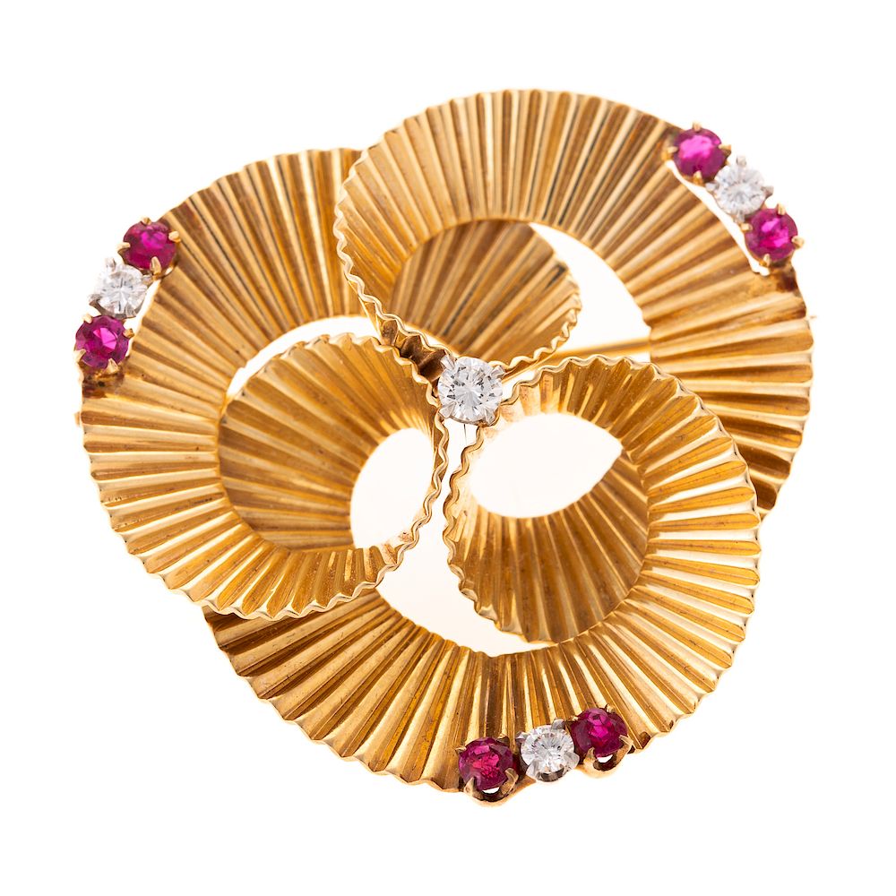 Appraisal: A Ladies Fluted Spiral Pin with Rubies Diamonds K yellow