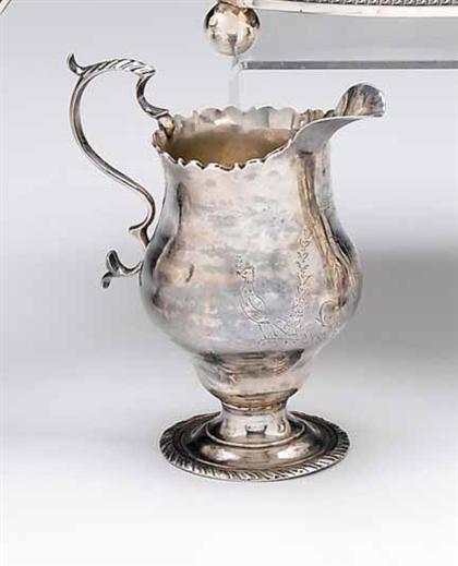 Appraisal: SIlver creamer Pear shape with crimped rim lyre handle on