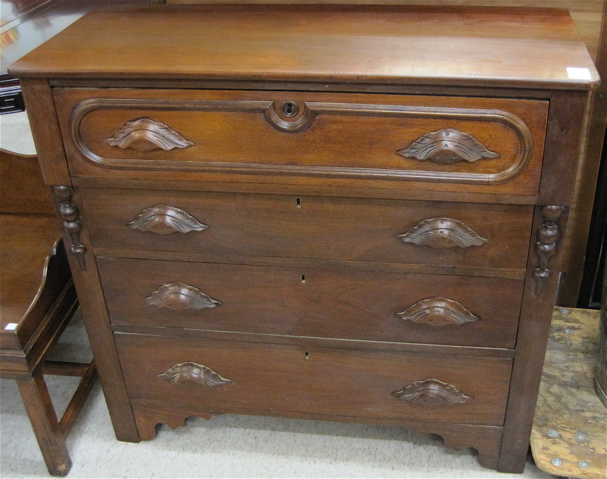 Appraisal: VICTORIAN WALNUT CHEST OF DRAWERS American th century with one