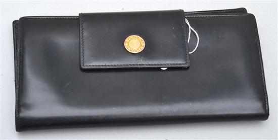 Appraisal: A BLACK LEATHER LONG PURSE BY BVLGARI