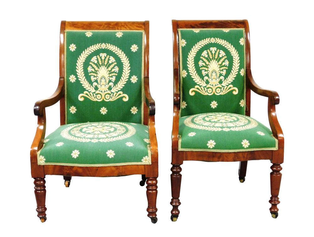 Appraisal: Two American Empire mahogany open armchairs c upholstered in green