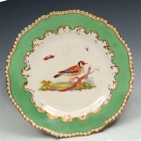 Appraisal: A TH CENTURY PORCELAIN DESSERT PLATE possibly Rockingham painted with