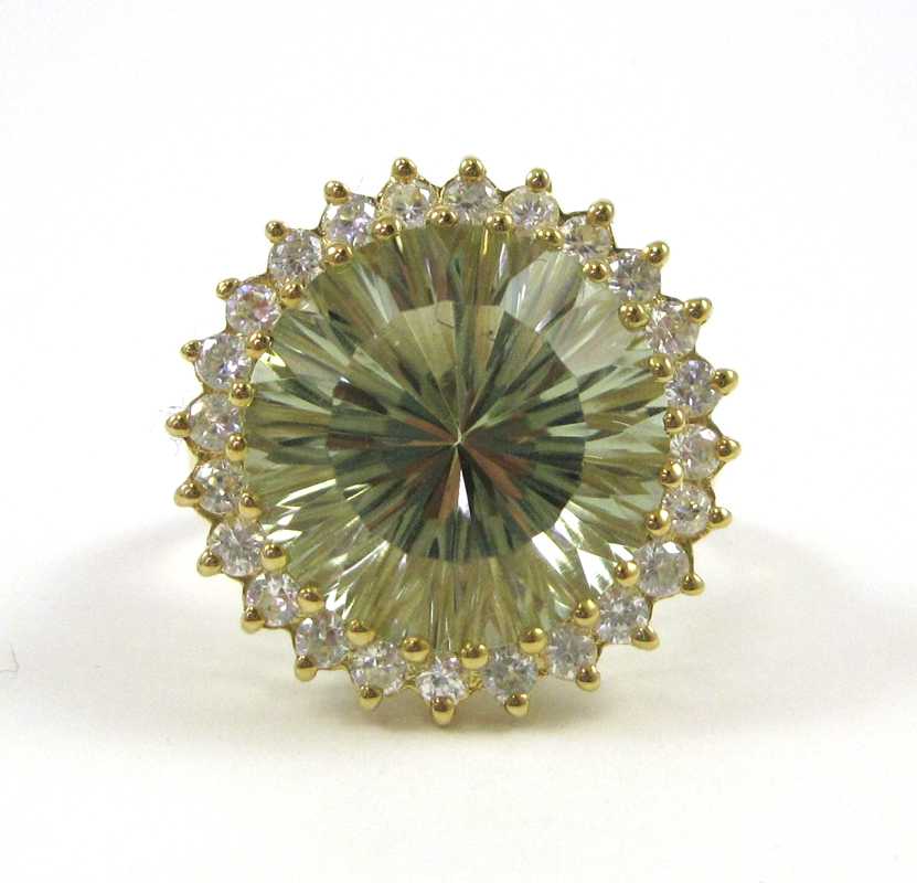 Appraisal: TEN KARAT GOLD PRASIOLITE AND ZIRCON RING round cut prasiolite