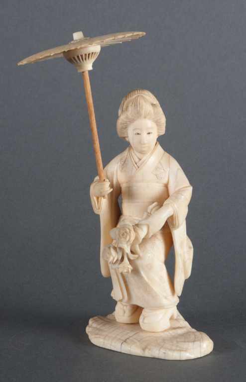 Appraisal: Japanese carved ivory figure of a geisha Meiji early th