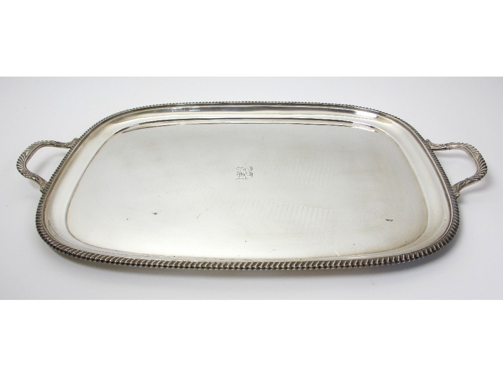 Appraisal: A silver twin handled serving tray by Harrison Bros George