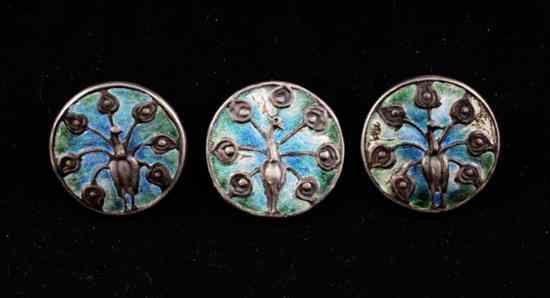 Appraisal: A set of three Liberty Co blue enamelled silver buttons