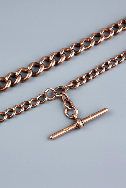 Appraisal: TWO ALBERT CHAINS comprising a fetter-link Albert chain with T-bar