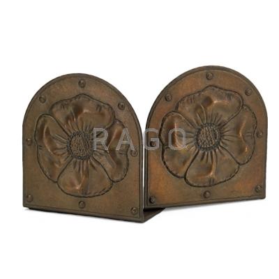 Appraisal: ROYCROFT Pair of hammered copper bookends with poppies East Aurora