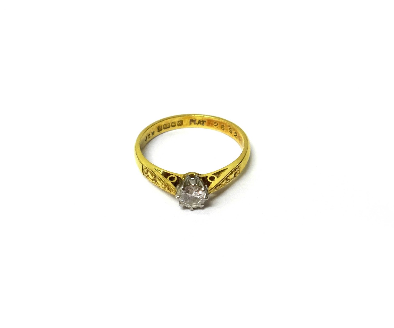 Appraisal: An ct gold and platinum diamond set single stone ring