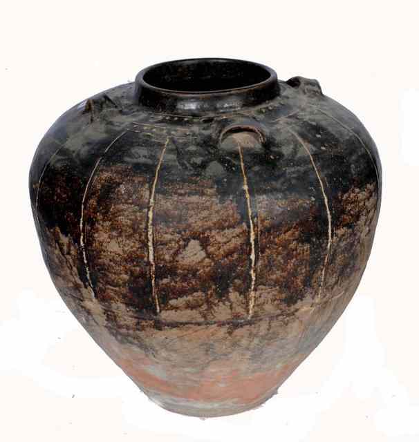 Appraisal: A LARGER SOUTH EAST ASIAN JAR with four lug handles