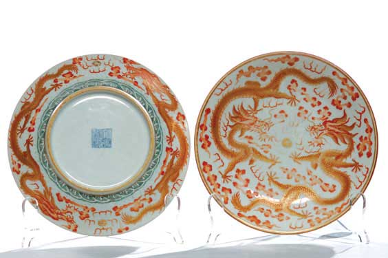 Appraisal: PAIR QIANLONG PORCELAIN PLATES Pair of antique Chinese coral red