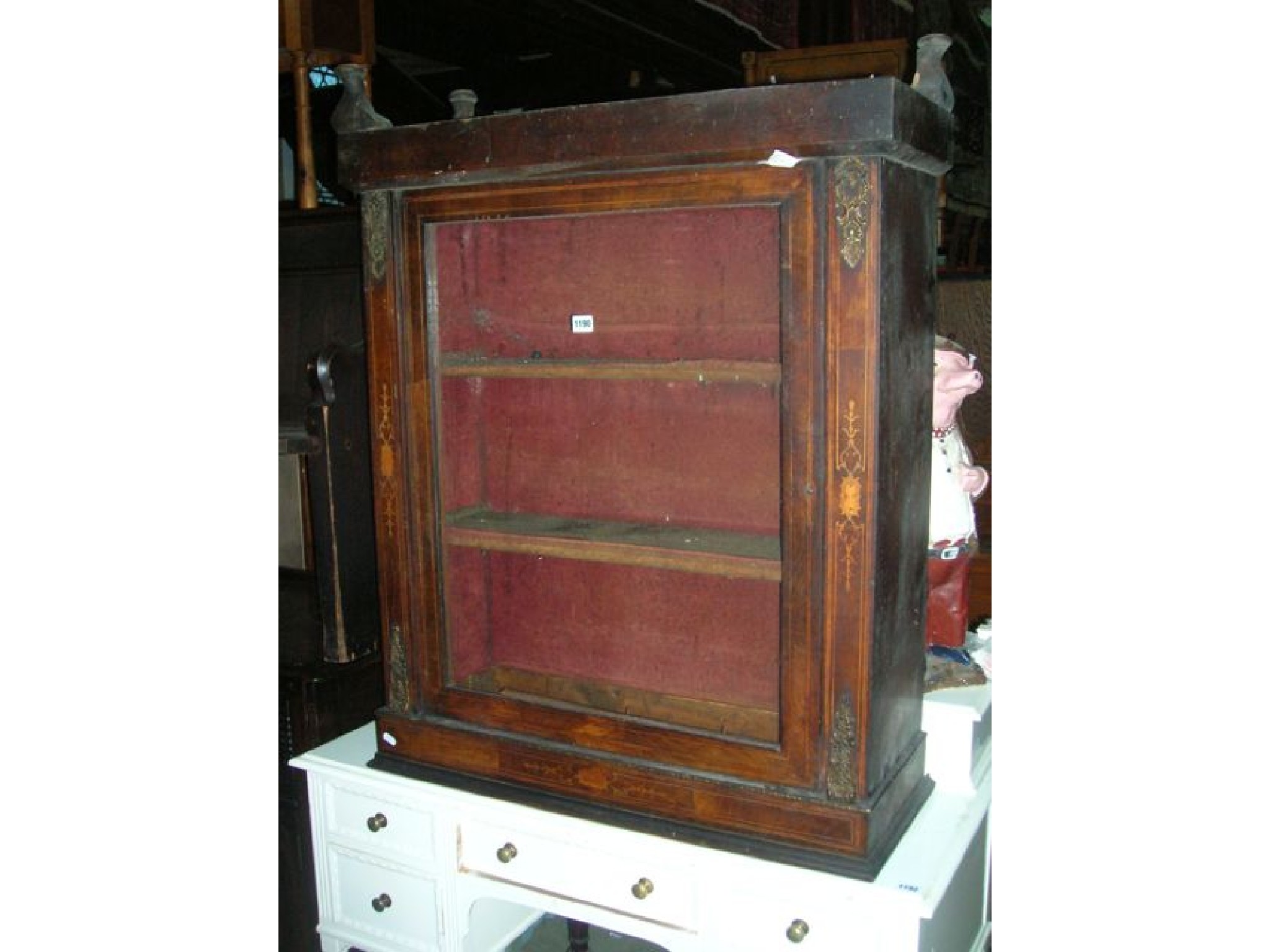 Appraisal: A Victorian walnut pier cabinet with inlaid detail and cast