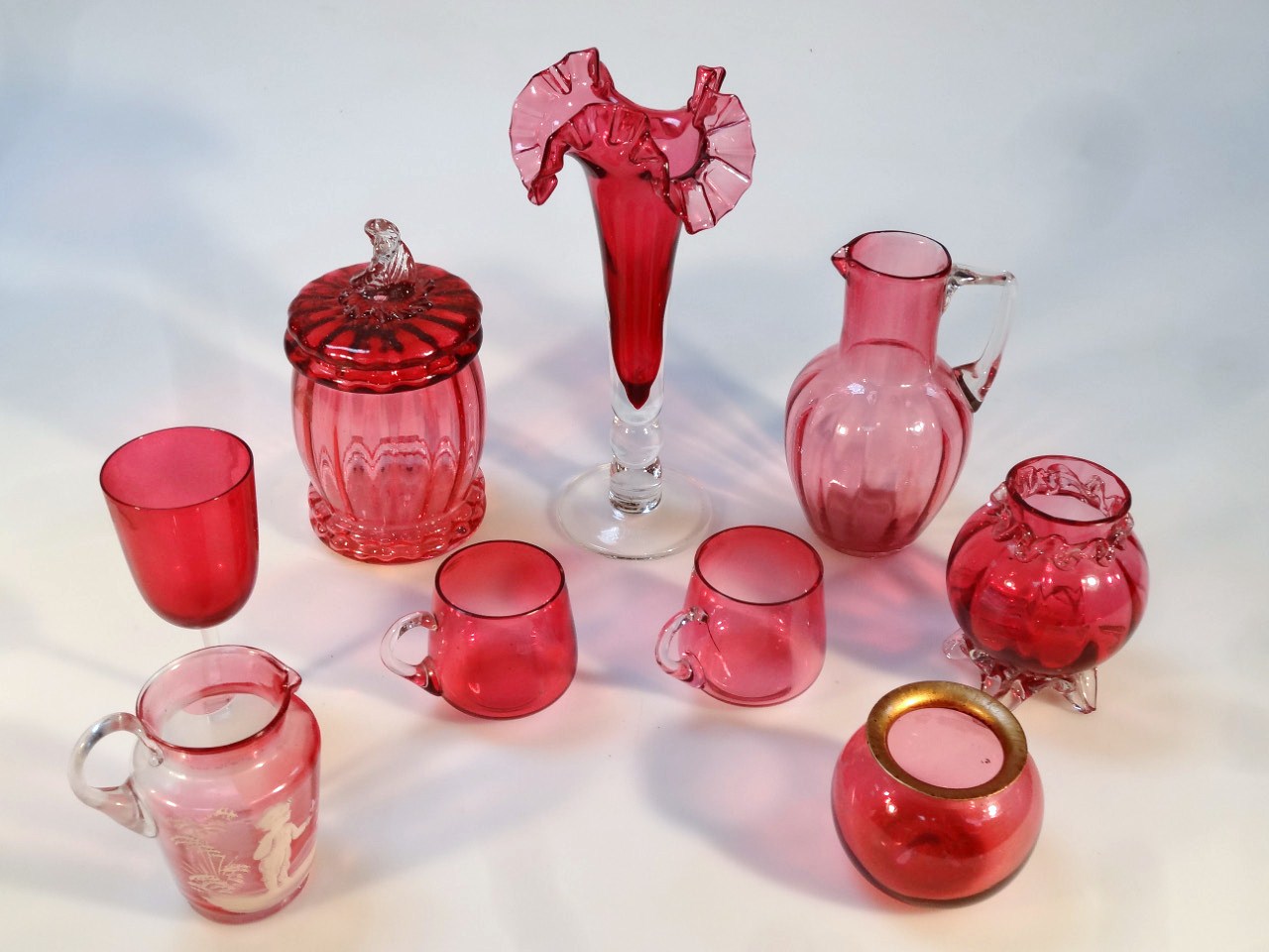 Appraisal: Various cranberry and ruby glass to include a Mary Gregory