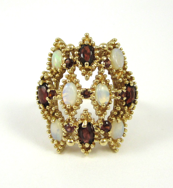 Appraisal: OPAL GARNET AND TEN KARAT GOLD RING set with six