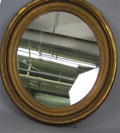 Appraisal: Large oval mirror In gilt frame L in