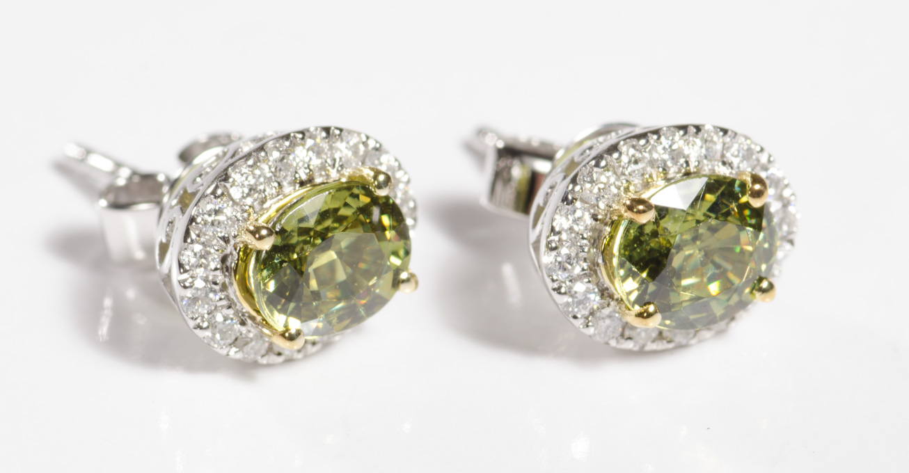 Appraisal: PAIR OF DEMANTOID AND DIAMOND EARRINGS each k white and