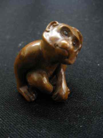 Appraisal: Carved Wooden Netsuke of a Monkey thinking '' signed excellent