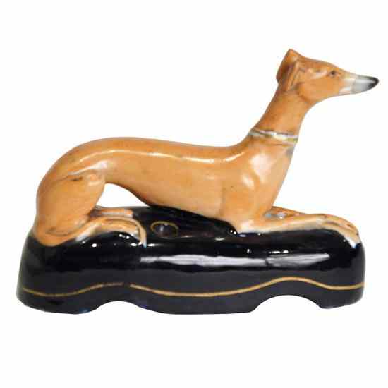 Appraisal: An English Victorian Staffordshire Pottery Whippet Inkwell circa the recumbent