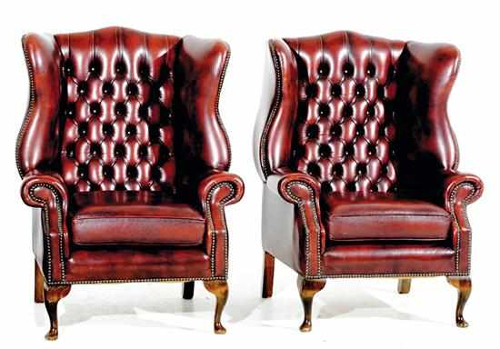 Appraisal: Pair Queen Anne style leather wingback chairs tufted shaped back