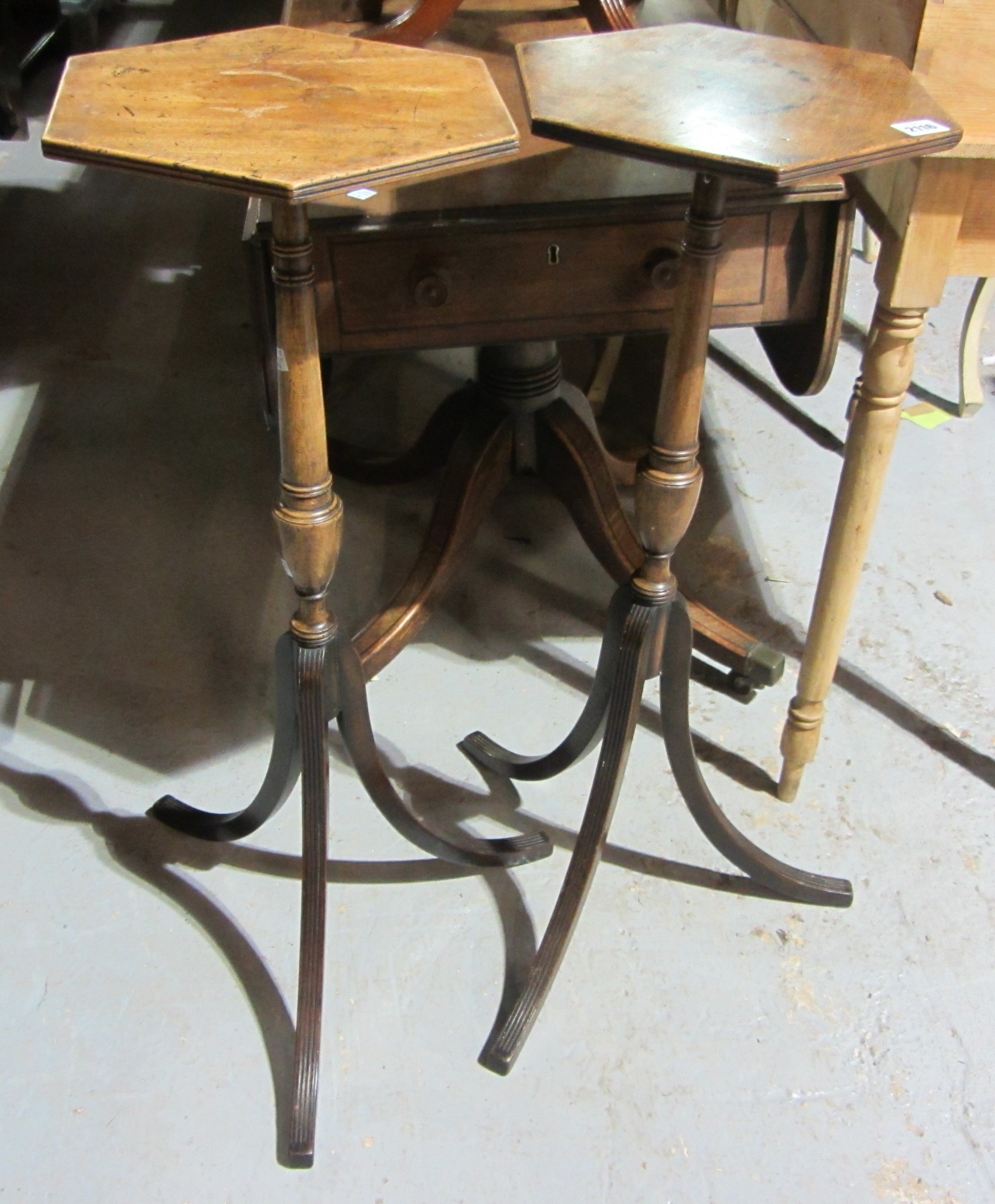 Appraisal: A group of three mahogany tripod tables and two jardiniere