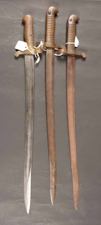 Appraisal: Three bayonets one marked '' '' on grip one marked