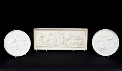 Appraisal: A pair of Royal Copenhagen circular plaques depicting Day and