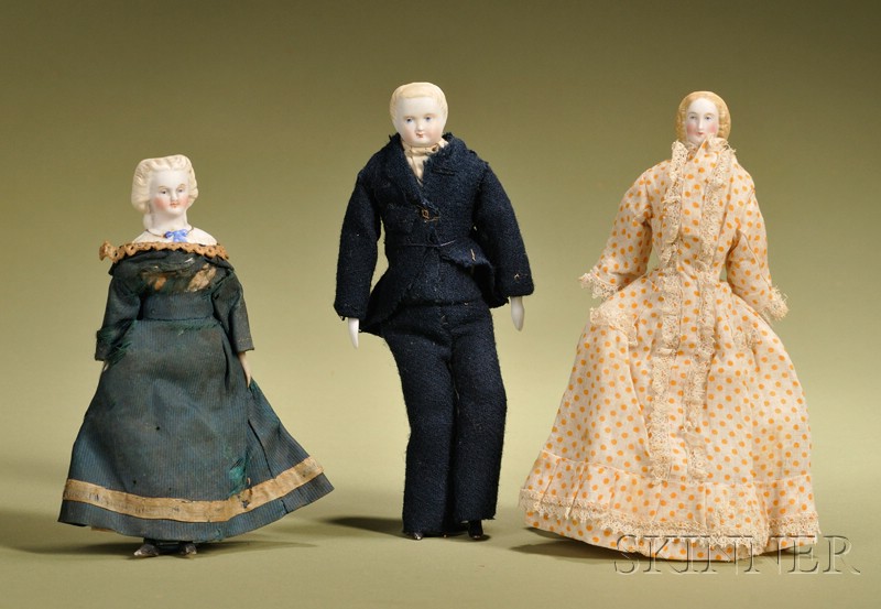 Appraisal: Three Dollhouse Dolls Germany c all with untinted bisque parian-type