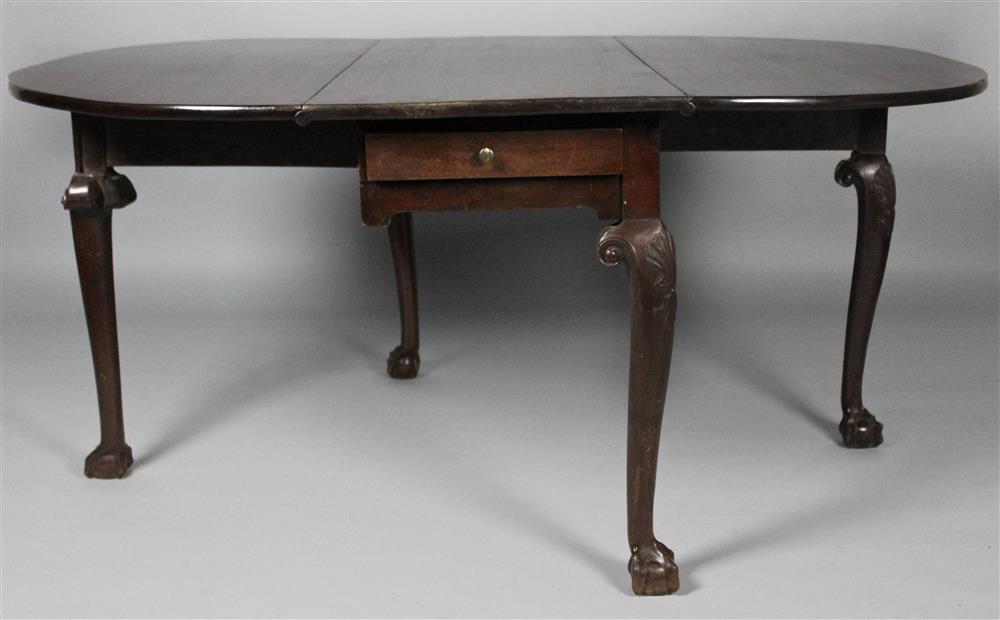 Appraisal: GEORGIAN CARVED MAHOGANY DROP LEAF TABLE CIRCA having a rectangular