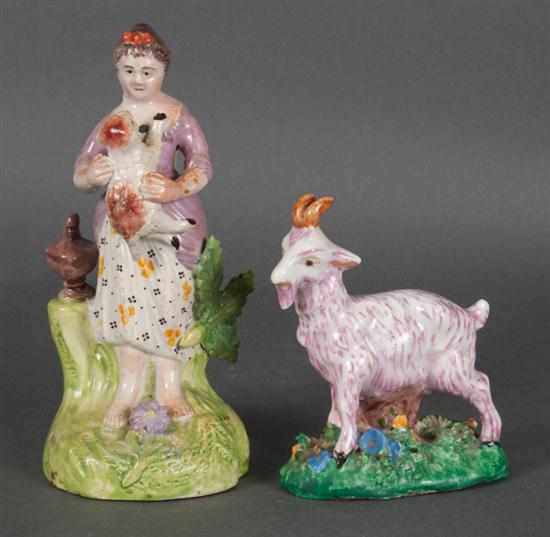 Appraisal: Staffordshire earthenware figure of a young girl with goat and