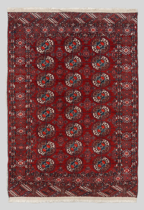 Appraisal: APPROX - YR OLD TURKOMAN BOKHARA HAND KNOTTED WOOL RUG