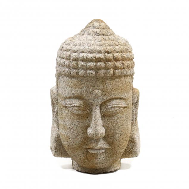 Appraisal: LARGE CARVED GRANITE HEAD OF BUDDHA Second half th century