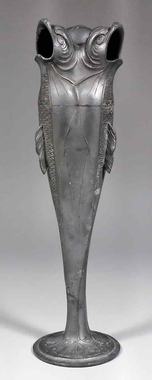 Appraisal: An early th Century ''Osiris'' pewter fish pattern table centre