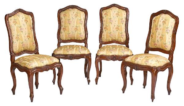 Appraisal: A set of four Italian Rococo walnut chairs third quarter