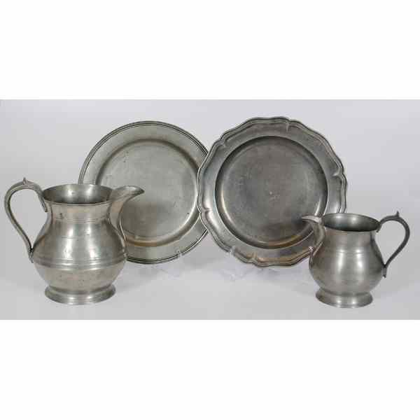 Appraisal: English Pewter Pitchers and Chargers English th century An assembled