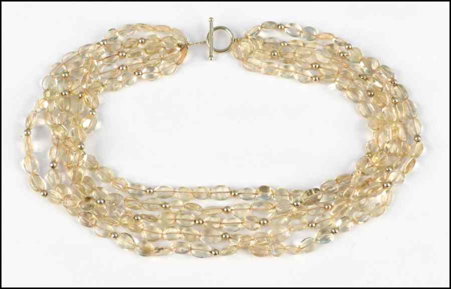 Appraisal: MULTI STRAND CITRINE BEADED NECKLACE With a karat yellow gold